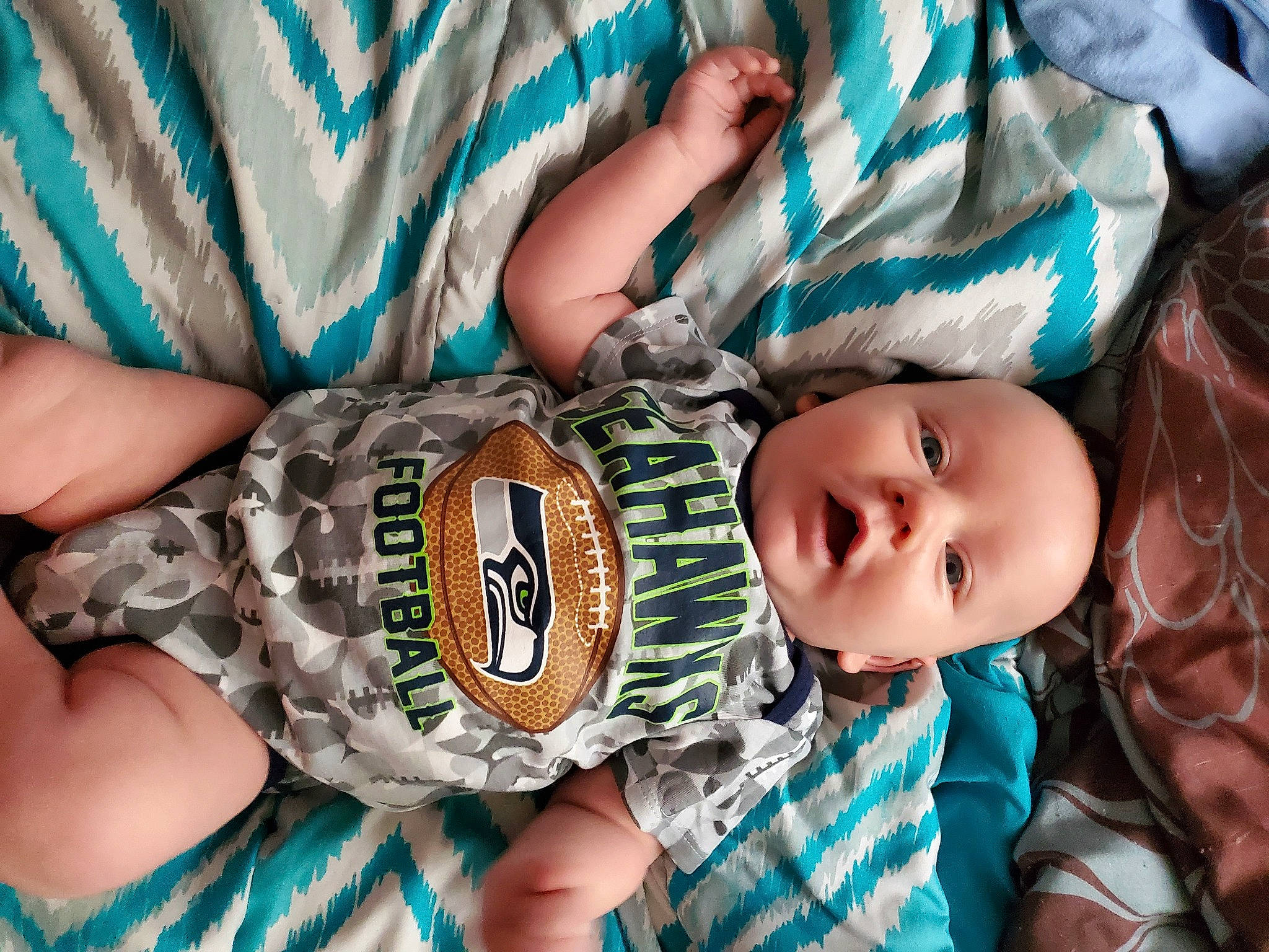 Lachlan joined the competition — help win amazing prizes! baby, baby_toddler_clothing, child, design, hand, pattern, person, toddler