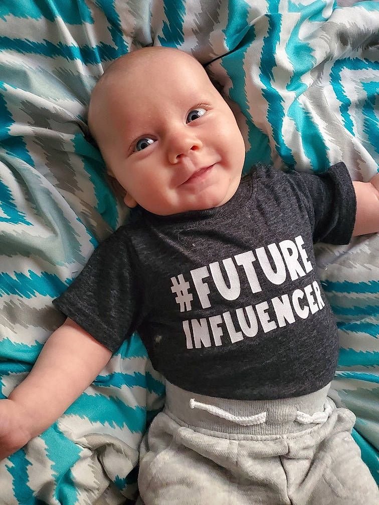 Lachlan joined the competition — help win amazing prizes! baby, baby_products, baby_toddler_clothing, blue, child, cool, joy, person, product, sleeve, smile, t_shirt, toddler, turquoise