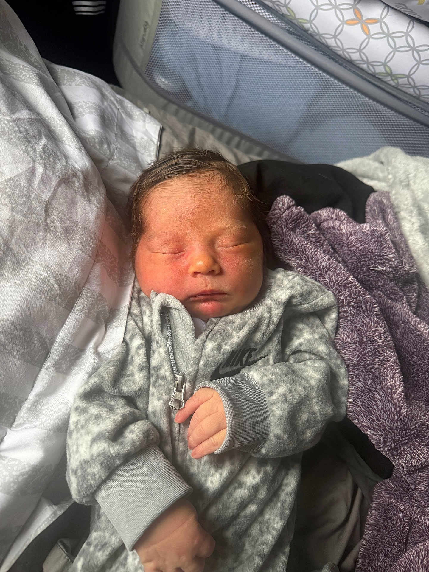 Emiliano is registered to the contest to win money with this photo: newborn, baby, sleeping, infant, blanket, clothing, nike, soft, cozy, hand, face, portrait, indoors, bed, comfort, cute, peaceful, child, fabric, rest