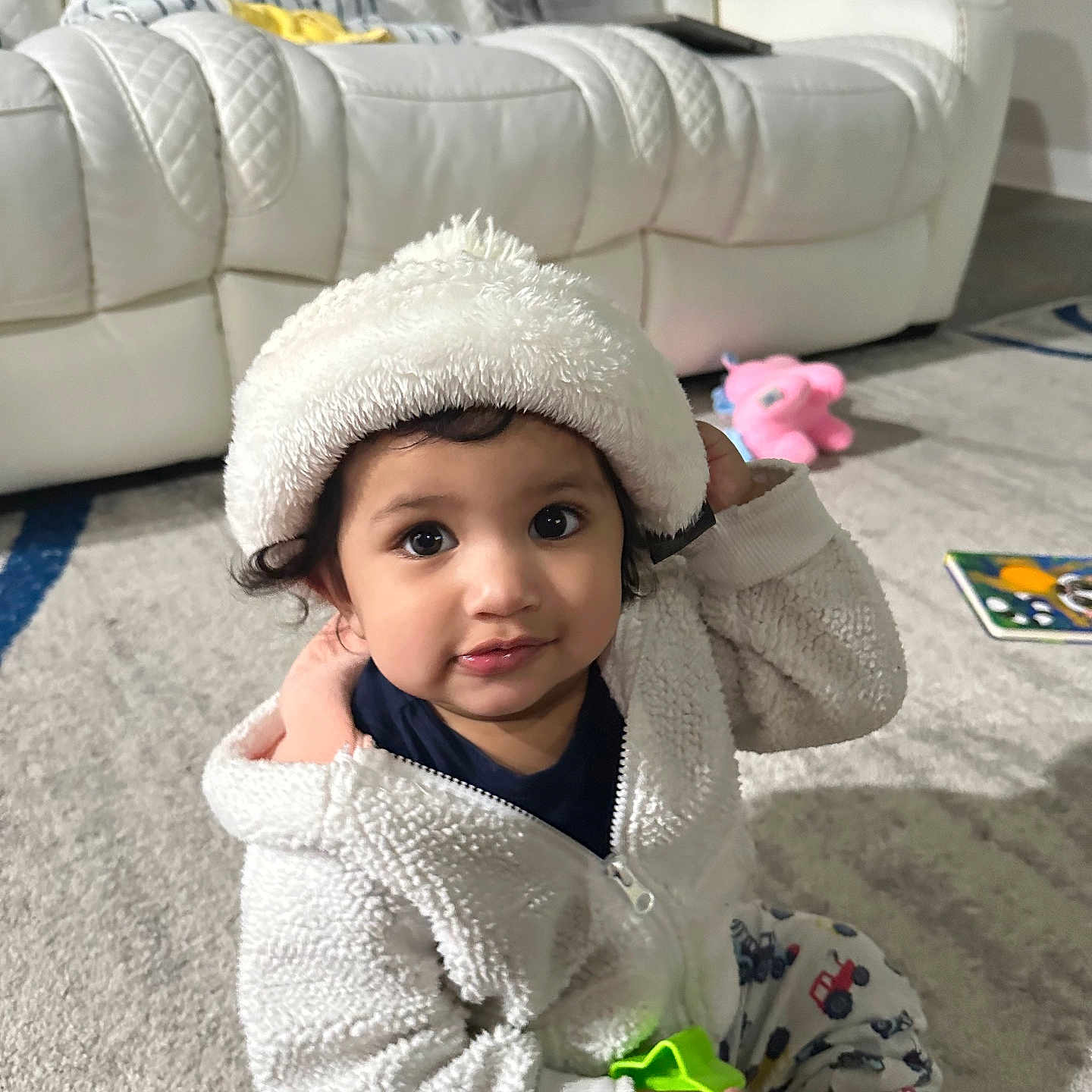 Avika joined the competition — help win amazing prizes! architecture, baby, bodypart, building, cap, clothing, couch, face, finger, furniture, hand, hat, head, indoors, knitwear, livingroom, person, photography, portrait, room