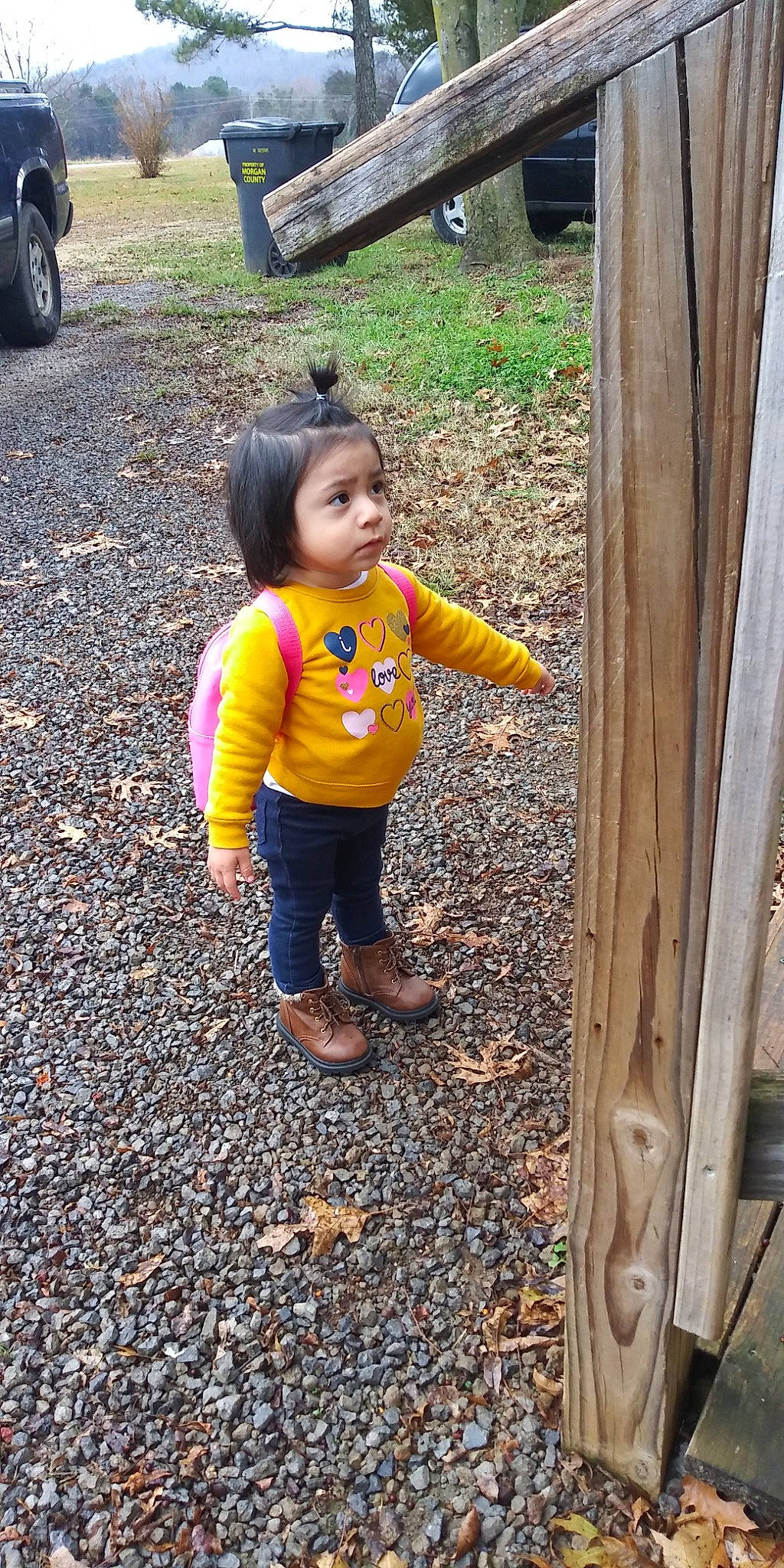 Alexa is registered to the contest to win money with this photo: alloy_wheel, auto_part, automotive_exterior, automotive_tire, automotive_wheel_system, baby_toddler_clothing, bicycles_equipment_and_supplies, denim, fender, foot, hair, hubcap, person, rim, sandal, synthetic_rubber, tire_care, toddler, tread, vehicle_registration_plate