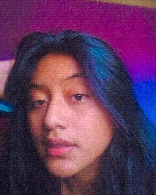 Galia Feliciano is registered to the contest to win money with this photo: beauty, black_hair, cheek, chin, cool, eye, eyebrow, face, forehead, hair, hairstyle, head, human, jaw, lip, long_hair, mouth, nose, person, purple