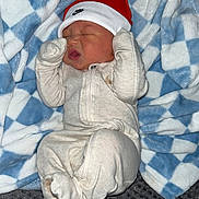 Sy Mir joined the competition — help win amazing prizes! newborn, baby, blanket, blue, white, checkered, hat, nike, onesie, sleeping, infant, cozy, soft, clothing, cute, face, small, hands, lying, resting