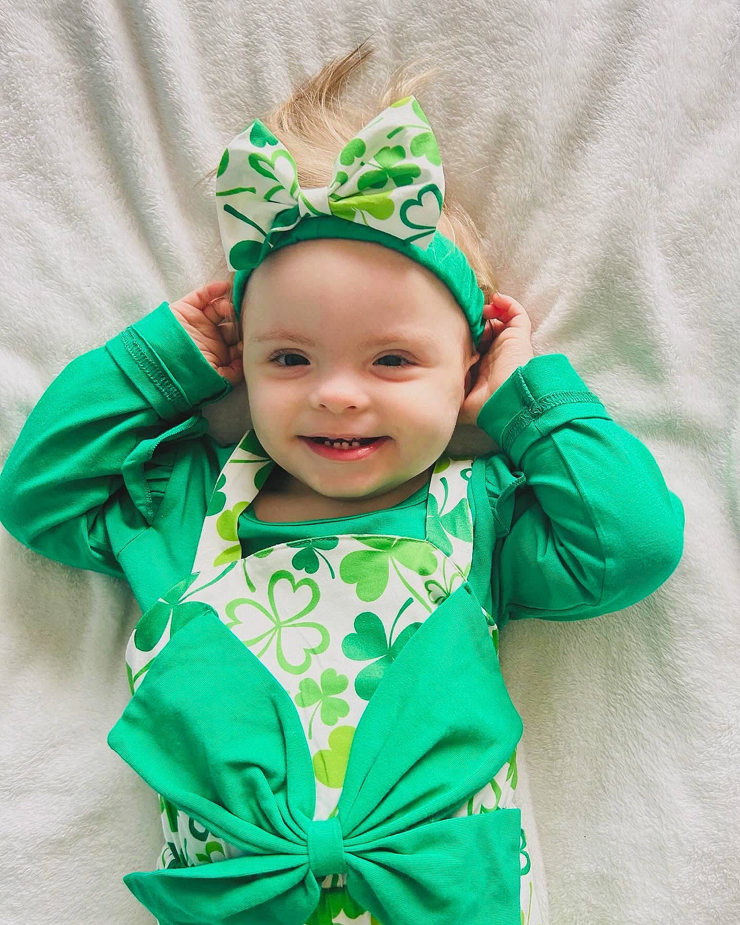 Laila is registered to the contest to win money with this photo: baby, baby_toddler_clothing, child, costume, costume_hat, event, face, fashion_accessory, fun, hair_accessory, happy, head, headband, headpiece, headwear, holiday, joy, party_supply, person, room