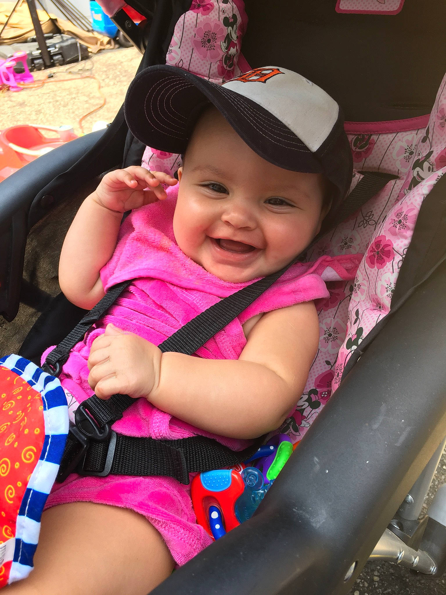 Kayloni is registered to the contest to win money with this photo: baby, baby_carriage, baby_products, car_seat, child, daughter, fun, happy, headgear, joy, leg, leisure, person, pink, play, product, sitting, skin, summer, toddler