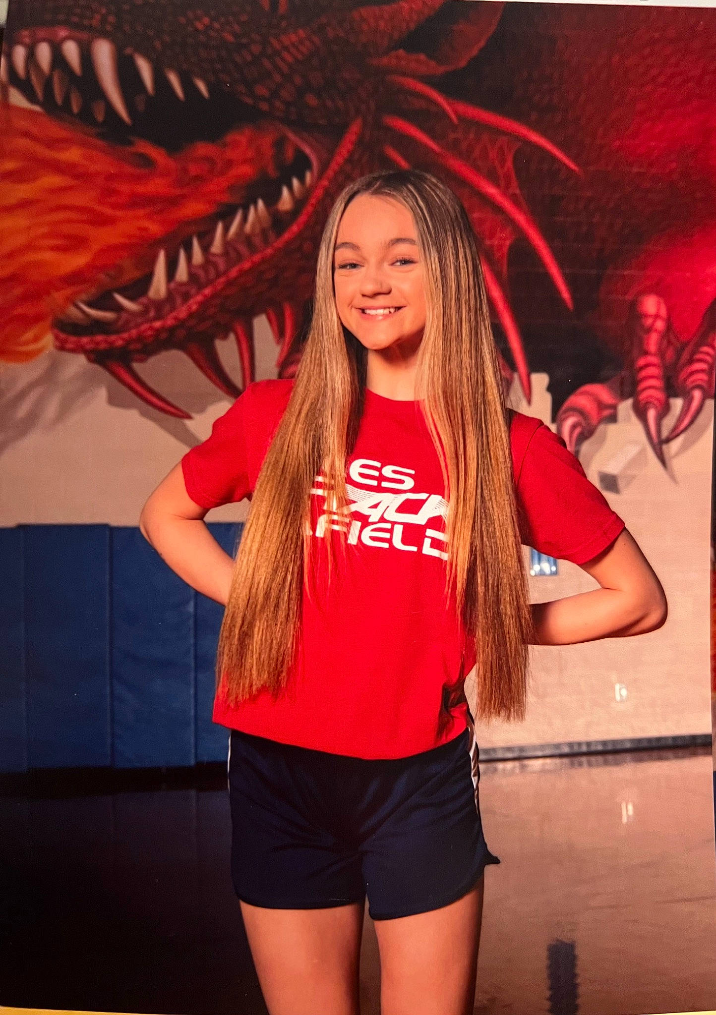 Madison is registered to the contest to win money with this photo: blond, blurred, entertainment, event, fashion_design, flash_photography, fun, happy, human, human_body, human_leg, joy, leisure, mouth, muscle, person, pink, red, shorts, smile