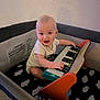 Mikey joined the competition — help win amazing prizes! baby, child, colorful, cute, face, floor, happy, indoor, infant, musical_instrument, person, piano, plastic, play, playpen, short_sleeves, sitting, smiling, toy, wall