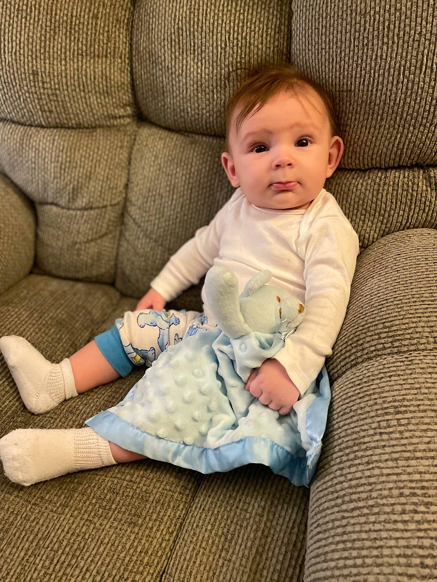 Archer is registered to the contest to win money with this photo: architecture, armchair, baby, baseball, baseballglove, blanket, blonde, bodypart, building, chair, clothing, costume, couch, cushion, doll, dress, face, finger, footwear, furniture