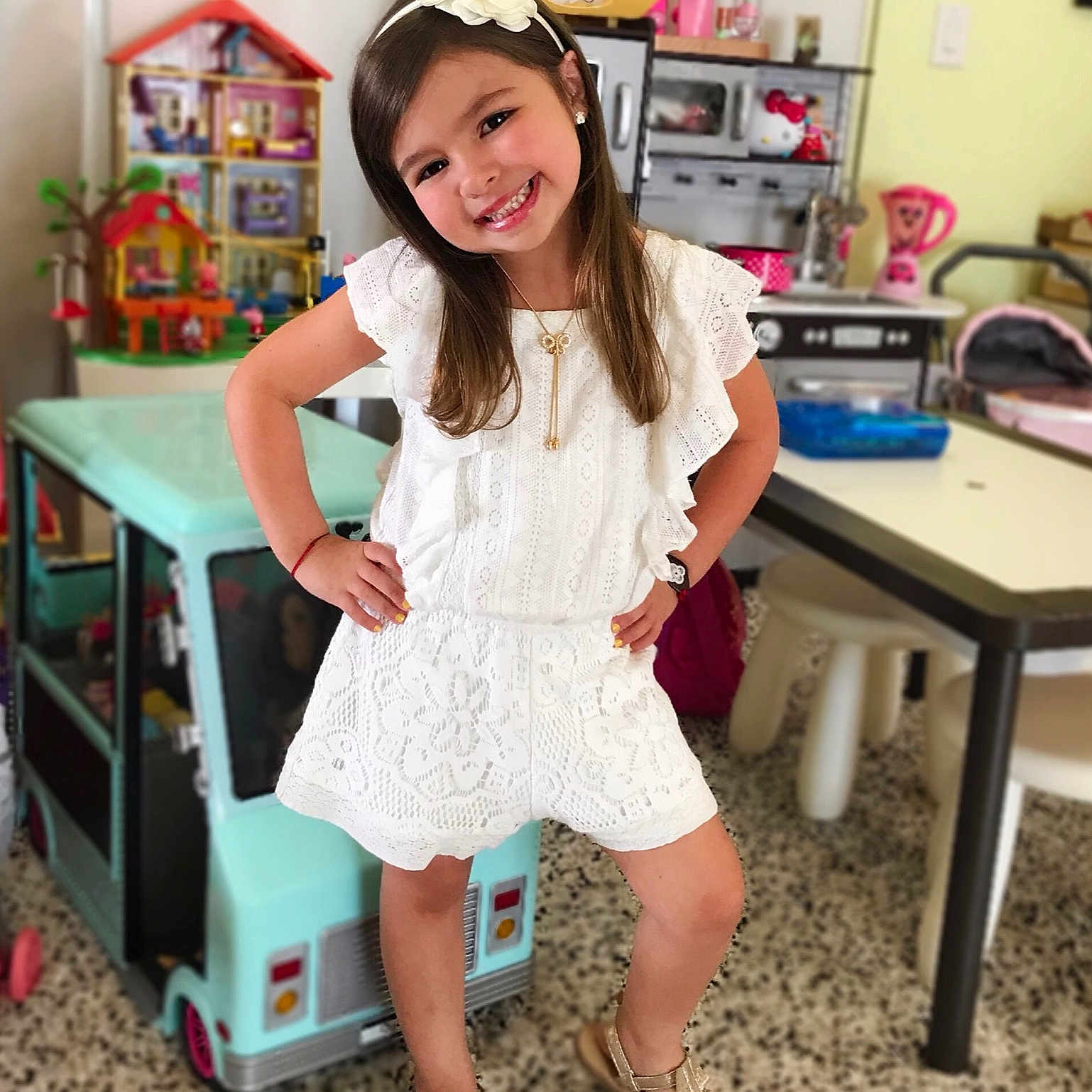Megan is registered to the contest to win money with this photo: child, child_model, clothing, daughter, dress, fashion_accessory, fashion_design, furniture, joy, leg, long_hair, person, pink, play, room, sleeve, smile, toddler