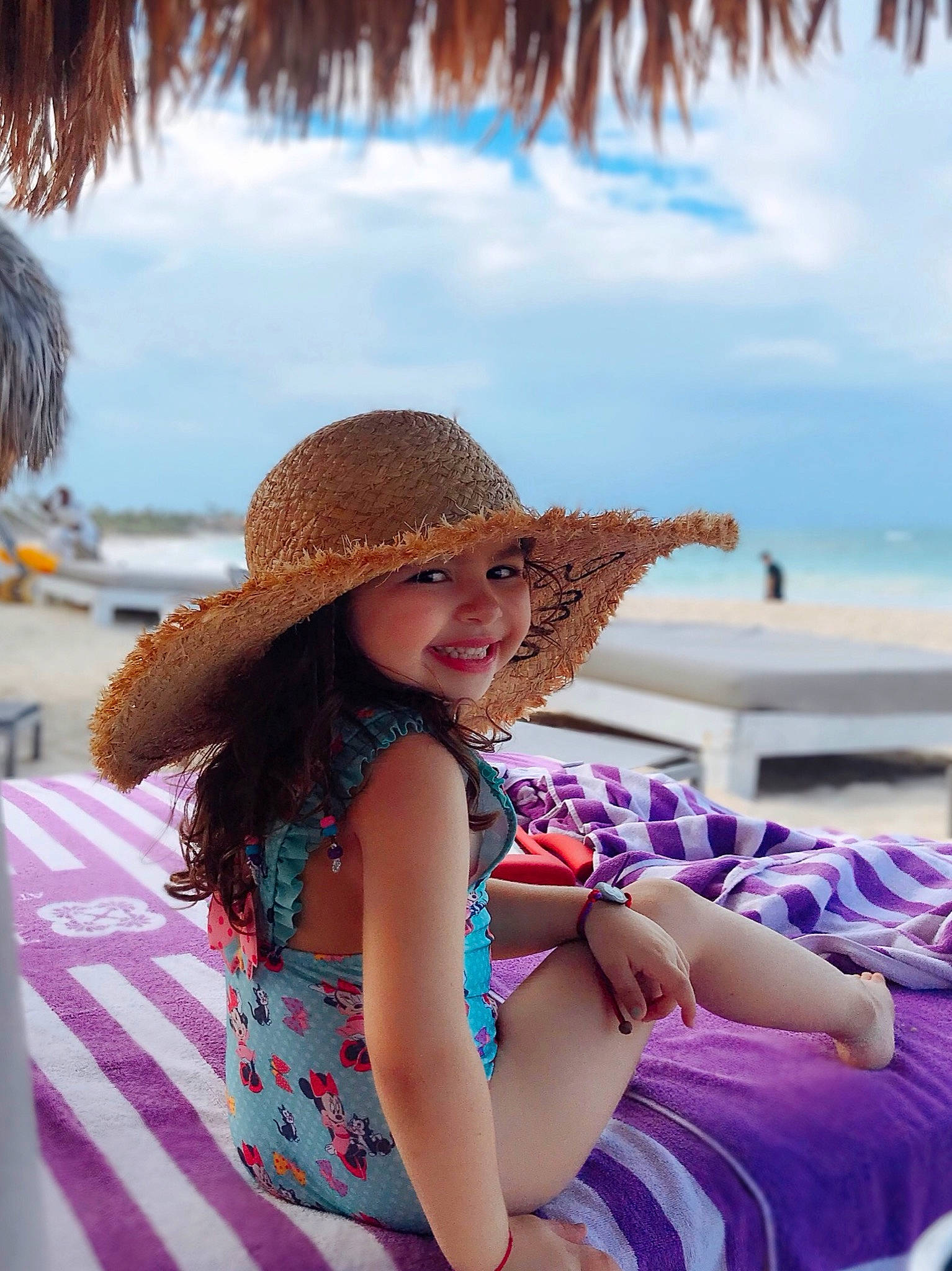 Megan joined the competition — help win amazing prizes! beach, beauty, child, fashion_accessory, fedora, fun, happy, hat, headgear, joy, leisure, long_hair, ocean, person, sea, summer, sun_hat, sun_tanning, swimwear, travel