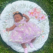 Dyomni is registered to the contest to win money with this photo: baby, infant, sleeping, dress, pink, gold, bow, cushion, floral, grass, outdoor, nature, peaceful, cute, child, newborn, sock, adorable, resting, portrait