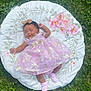 baby, infant, sleeping, dress, pink, gold, bow, cushion, floral, grass, outdoor, nature, peaceful, cute, child, newborn, sock, adorable, resting, portrait