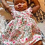 Dyomni is registered to the contest to win money with this photo: baby, infant, girl, sleeping, floral_dress, pink_bow, blanket, minnie_mouse, cartoon, cute, child, adorable, resting, soft, patterned_clothing, indoor, portrait, relaxed, small_person, headwear