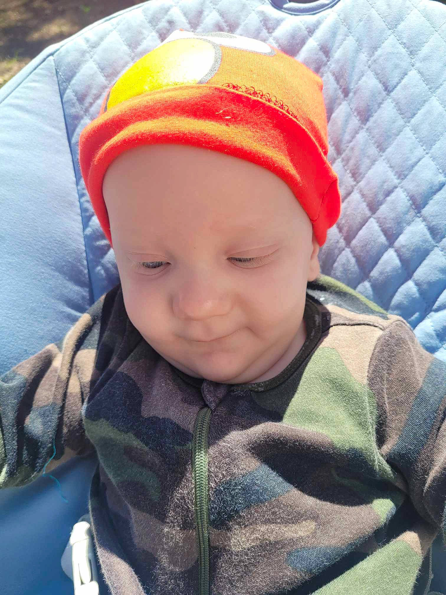Daryl joined the competition — help win amazing prizes! baby, baby_products, baby_toddler_clothing, beanie, cap, cheek, child, comfort, cool, electric_blue, fashion_accessory, grass, happy, headwear, knit_cap, outerwear, person, sleeve, smile, toddler