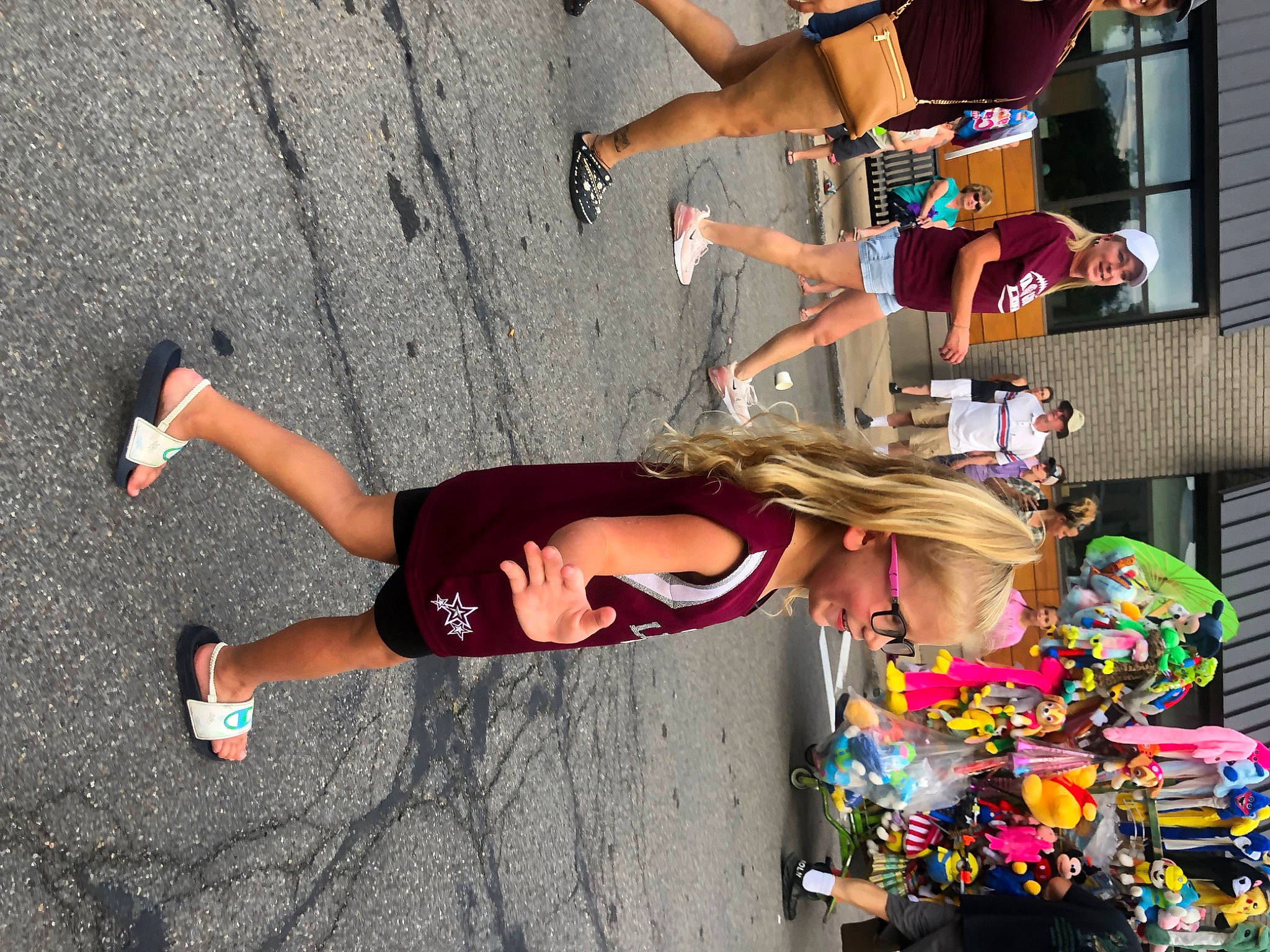 Avianna joined the competition — help win amazing prizes! blurred, event, eyewear, fun, headwear, human_leg, joy, knee, leisure, pedestrian, person, physical_fitness, public_event, recreation, road, running, shadow, shorts, street, sunglasses