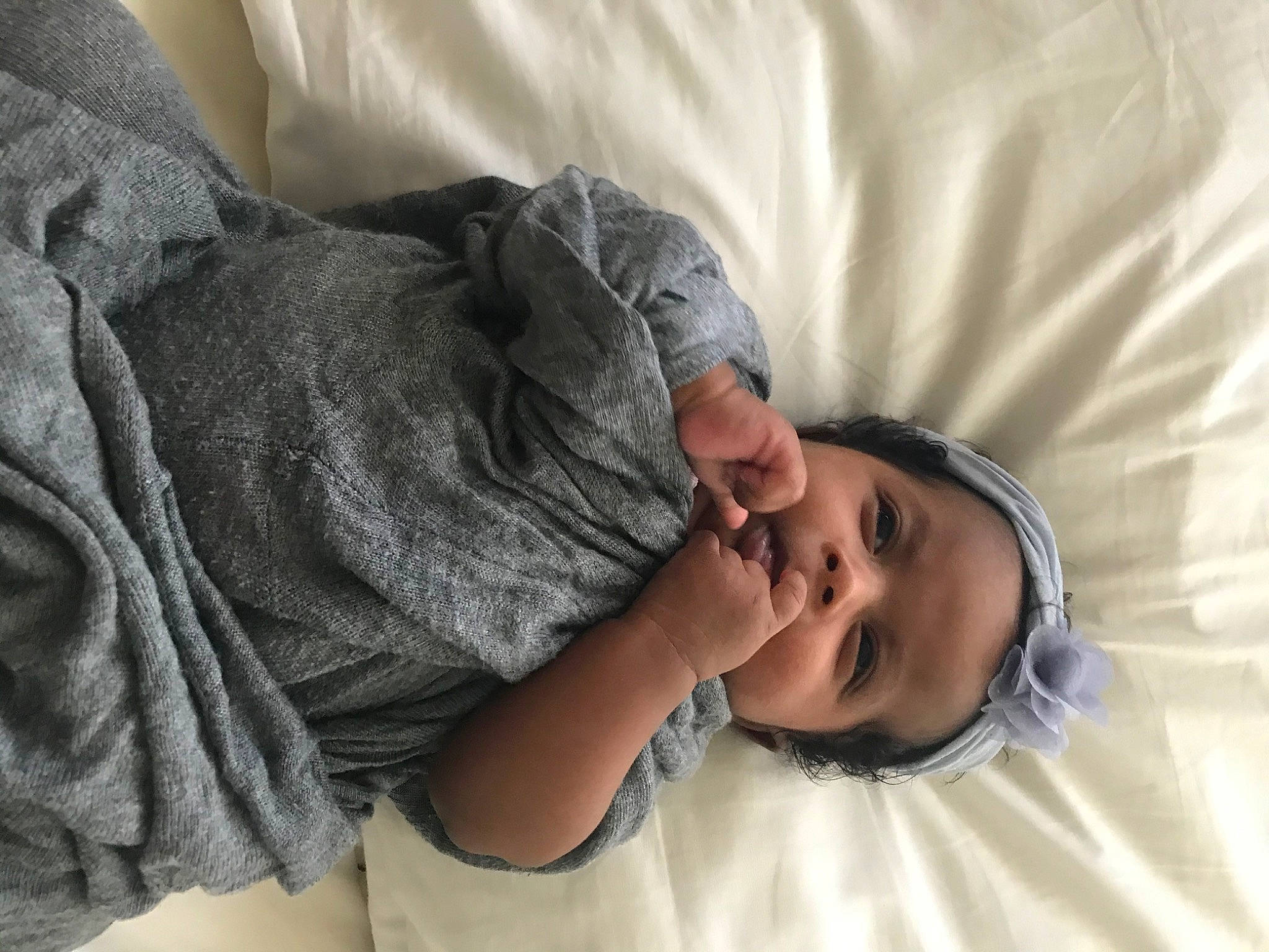 Ayantu is registered to the contest to win money with this photo: child, comfort, finger, gesture, hand, nap, person, sleep