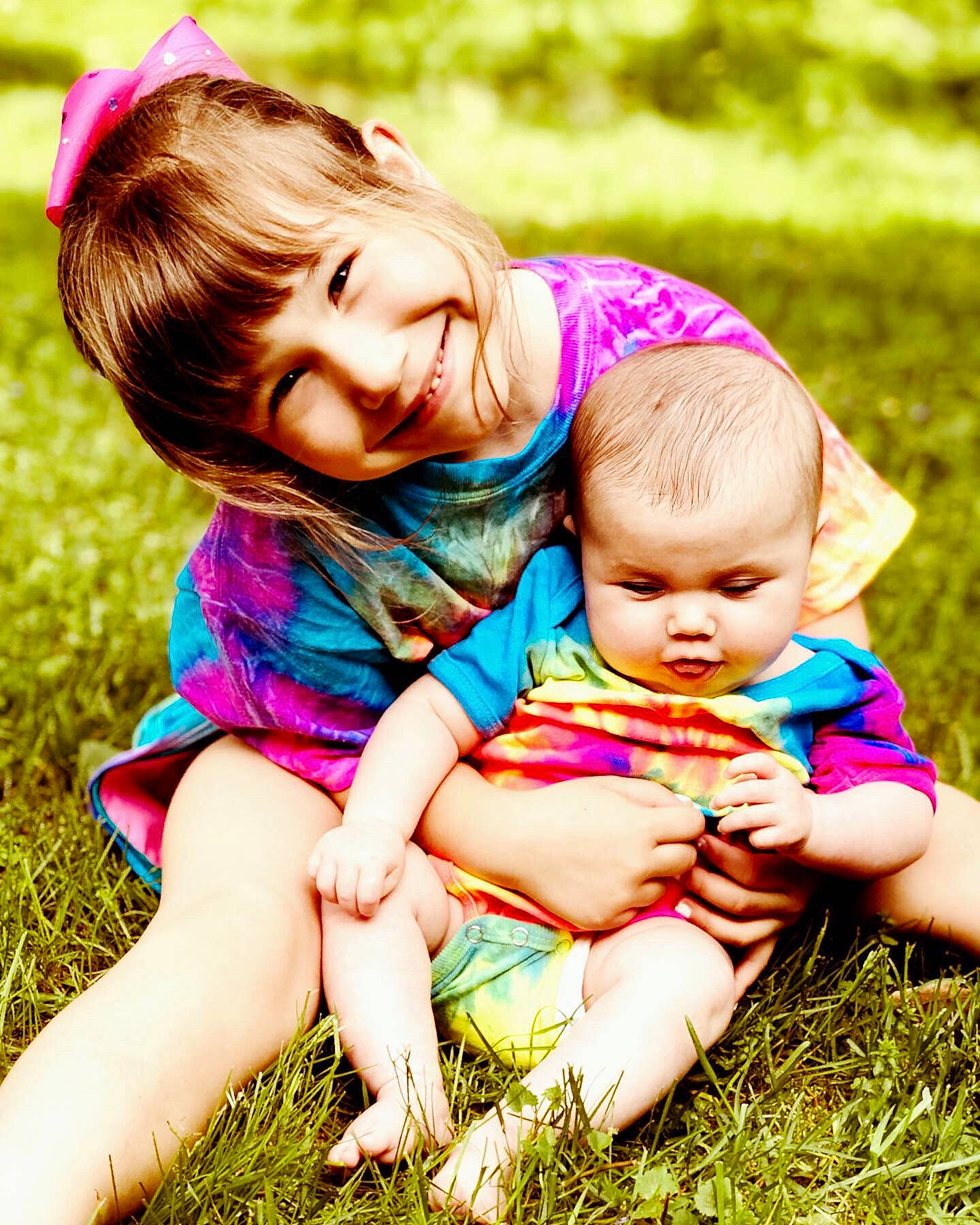 Kaylin joined the competition — help win amazing prizes! baby, child, fun, grass, grass_family, happy, interaction, meadow, people, people_in_nature, person, photograph, photography, pink, plant, play, playing_with_kids, sibling, spring, summer