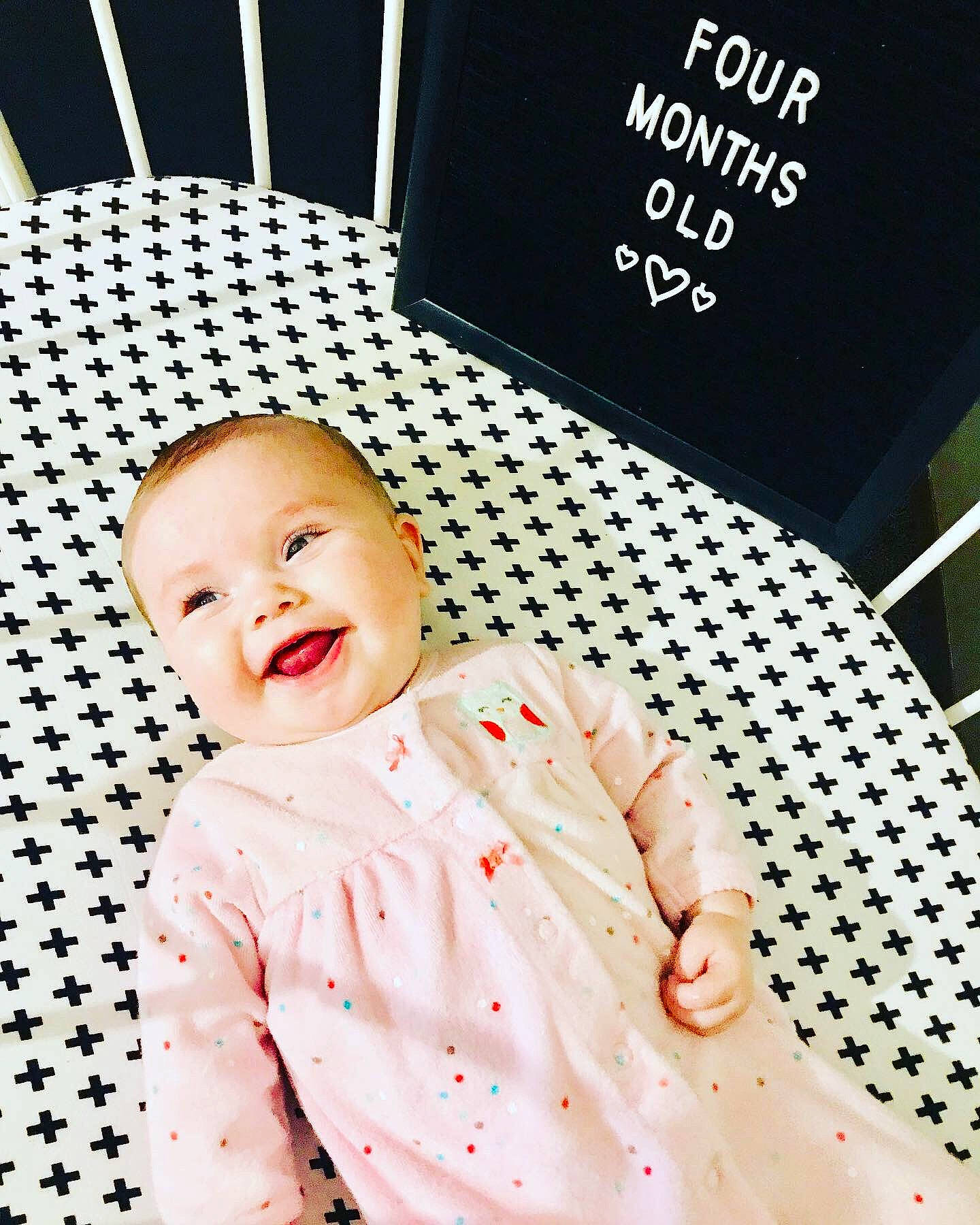 Clarke is registered to the contest to win money with this photo: baby, baby_toddler_clothing, cheek, child, cool, design, ear, fashion_accessory, happy, headgear, pattern, person, photography, pink, polka_dot, product, skin, sleeve, smile, toddler