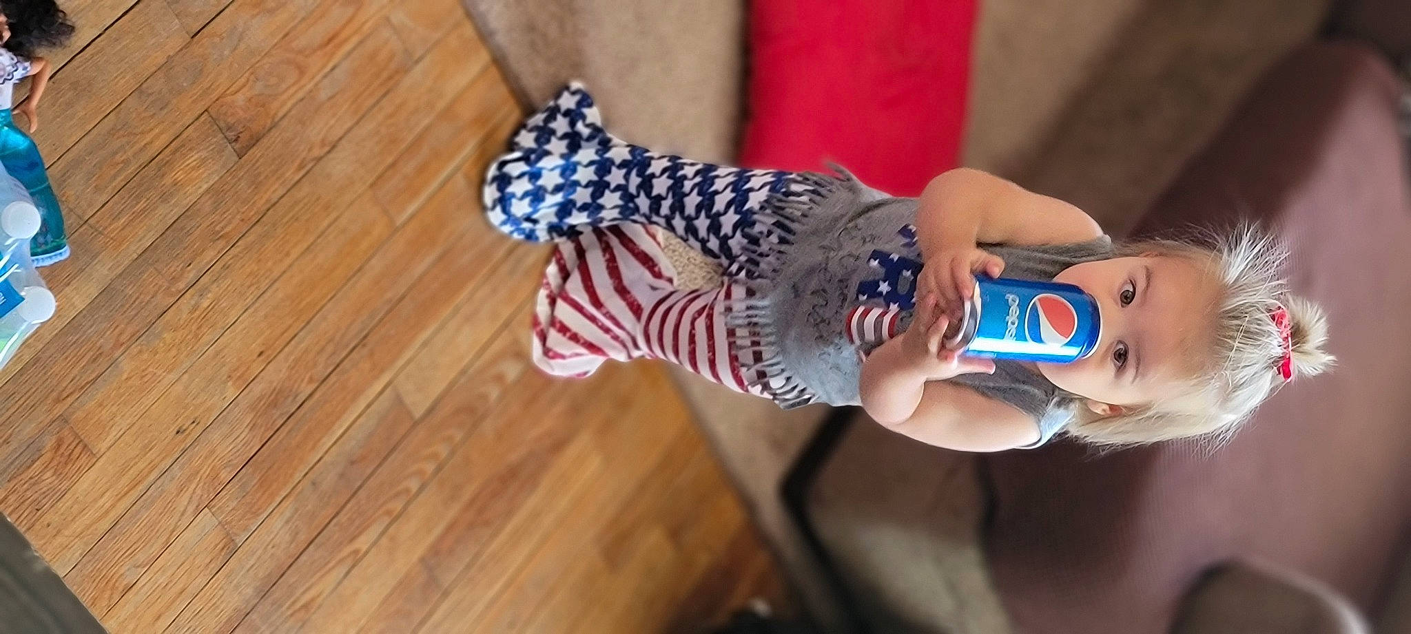 Allie joined the competition — help win amazing prizes! elbow, electric_blue, eyewear, fashion_accessory, flag_day_usa, flag_of_the_united_states, flooring, hand, hardwood, human_leg, nail, pattern, person, plank, sunglasses, thigh, tree, water, wood, wood_stain