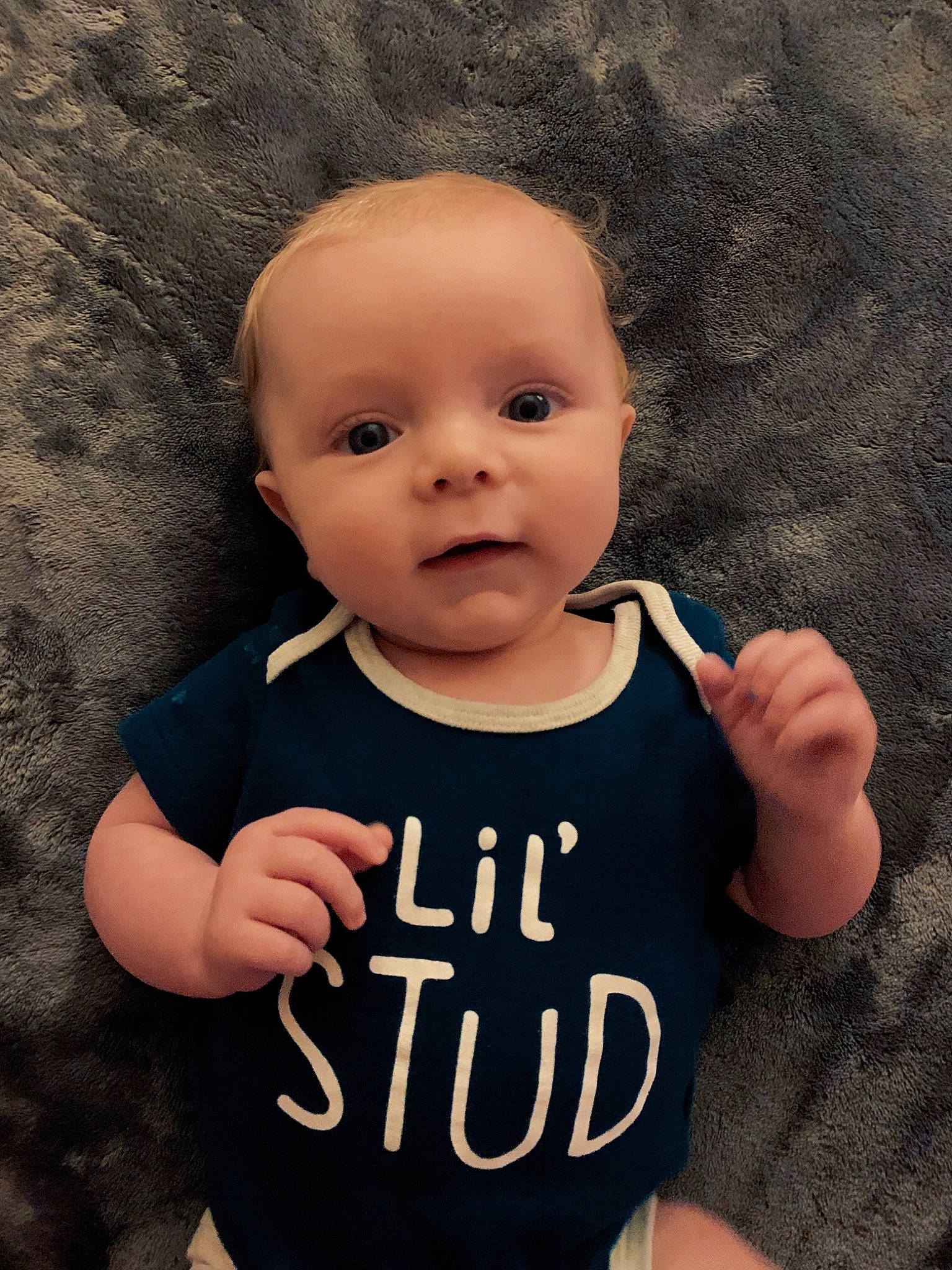 Aydan is registered to the contest to win money with this photo: arm, baby_toddler_clothing, cheek, chin, eye, eyebrow, facial_expression, finger, flash_photography, gesture, hand, happy, human_body, lip, mouth, neck, nose, person, skin, sleeve