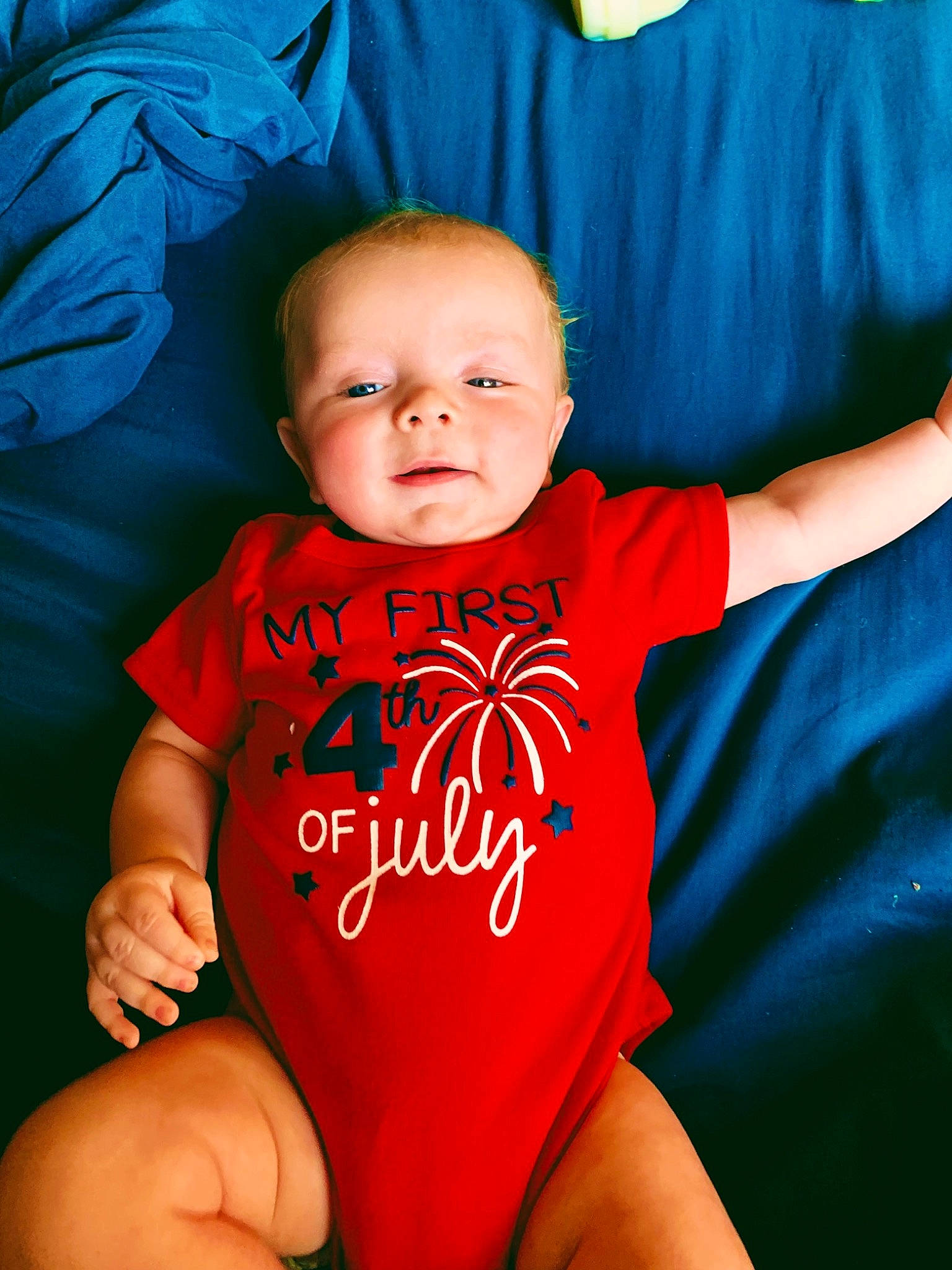 Aydan joined the competition — help win amazing prizes! arm, baby, baby_toddler_clothing, blue, chin, eye, face, facial_expression, hairstyle, head, human_body, mouth, muscle, neck, person, skin, sleeve, smile, standing, stomach