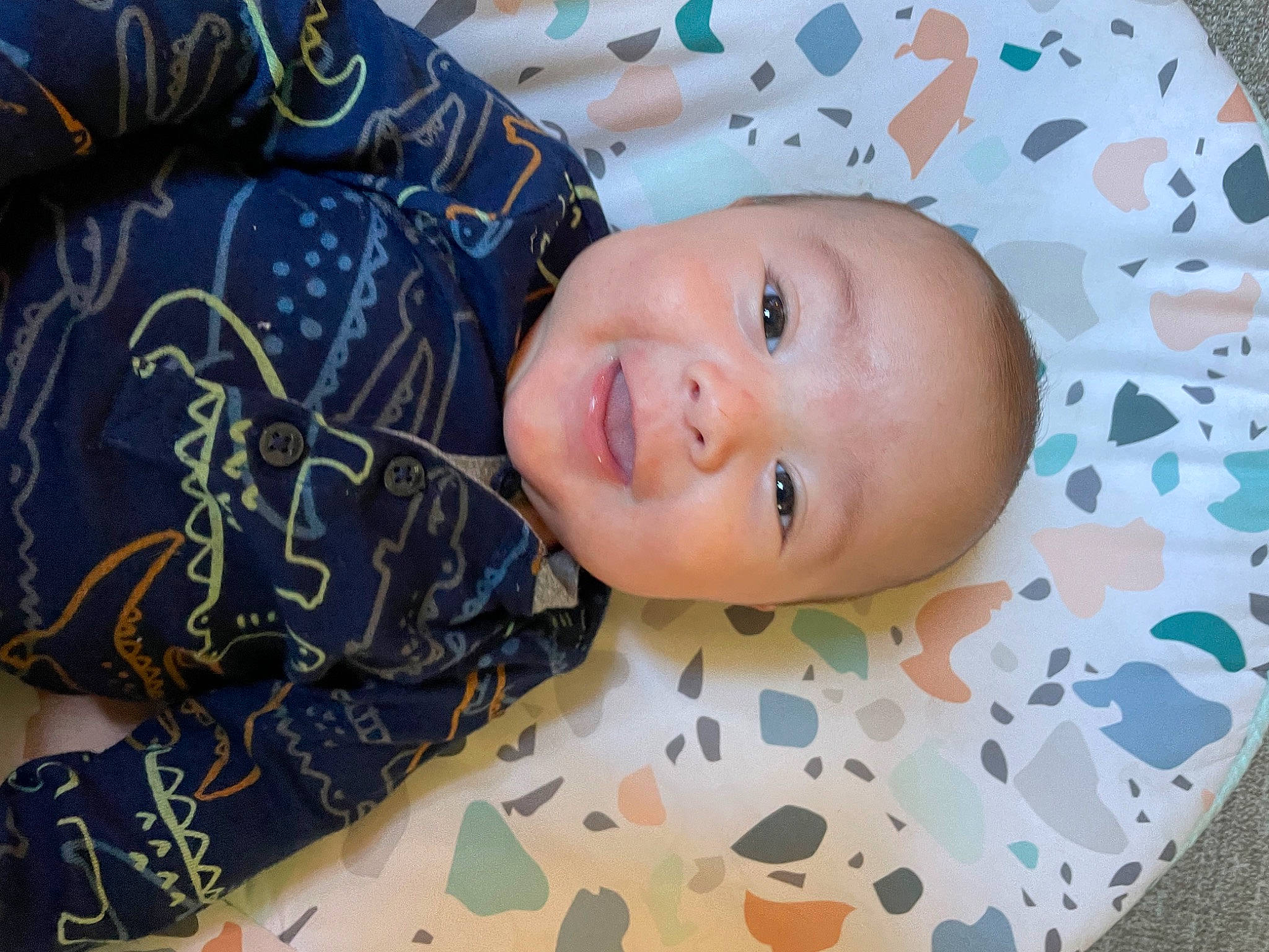 Klay joined the competition — help win amazing prizes! baby, baby_laughing, baby_toddler_clothing, cheek, child, comfort, eye, fun, happy, linens, pattern, person, room, skin, sleeve, smile, textile, toddler, tree, white