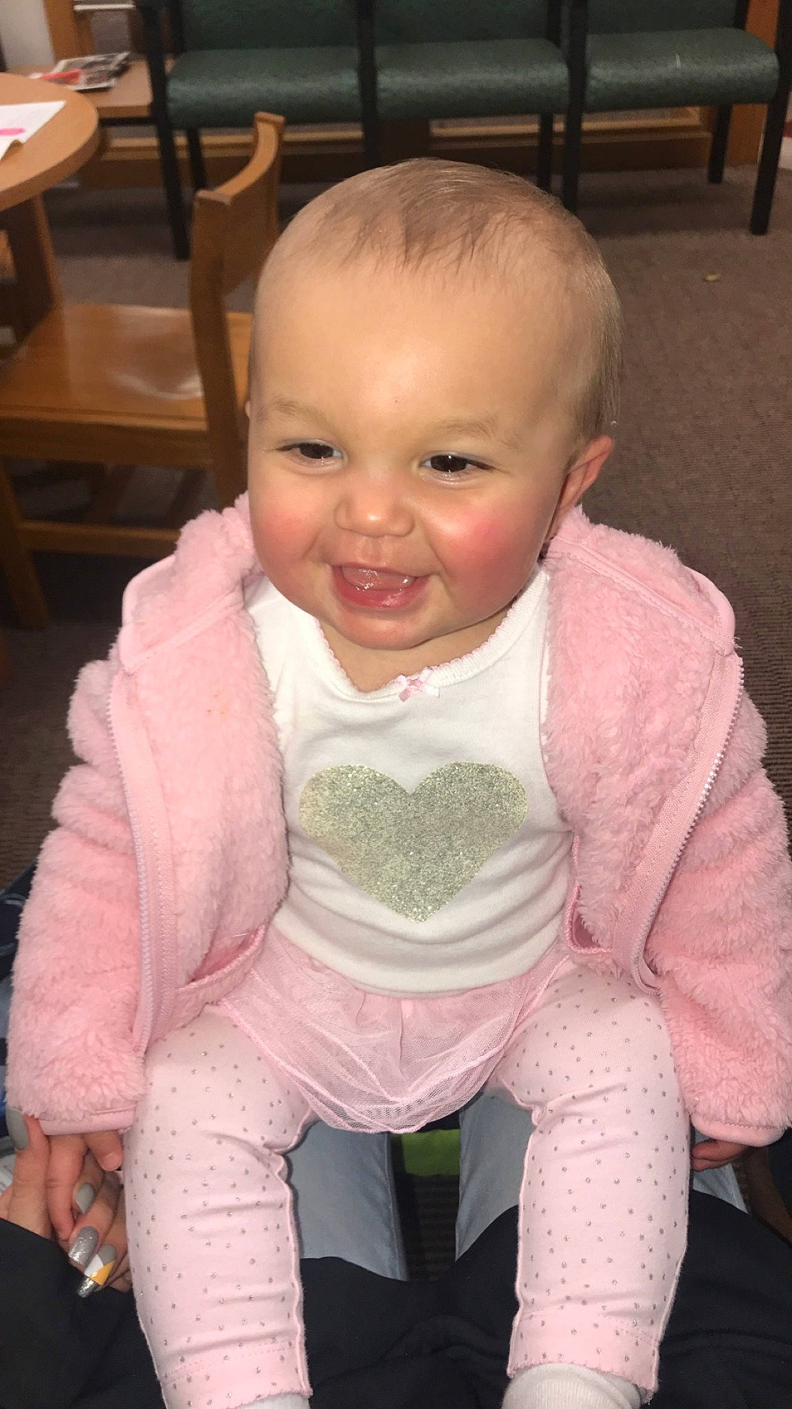 Serenity is registered to the contest to win money with this photo: baby, baby_products, baby_toddler_clothing, cheek, child, head, joy, person, pink, sitting, skin, smile, toddler