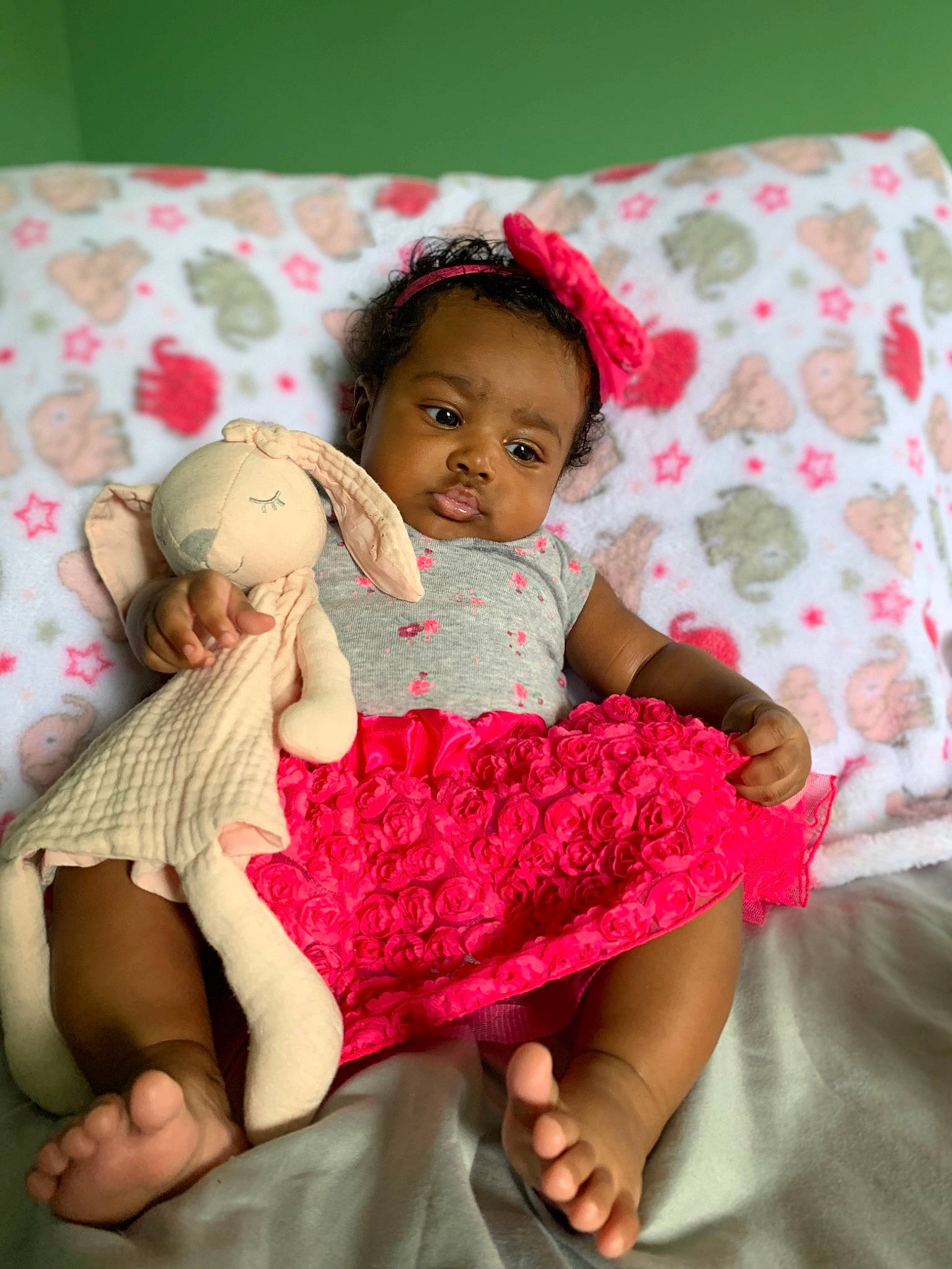 Aziyah is registered to the contest to win money with this photo: baby, child, comfort, person, pink, sibling, textile, toddler