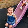 Navaya joined the competition — help win amazing prizes! child, girl, playground, slide, pink_slide, blue_dress, pigtails, smiling, outdoor, brick_wall, rubber_flooring, shoes, socks, play, fun, summer_clothing, young_child, two_children, casual, happy