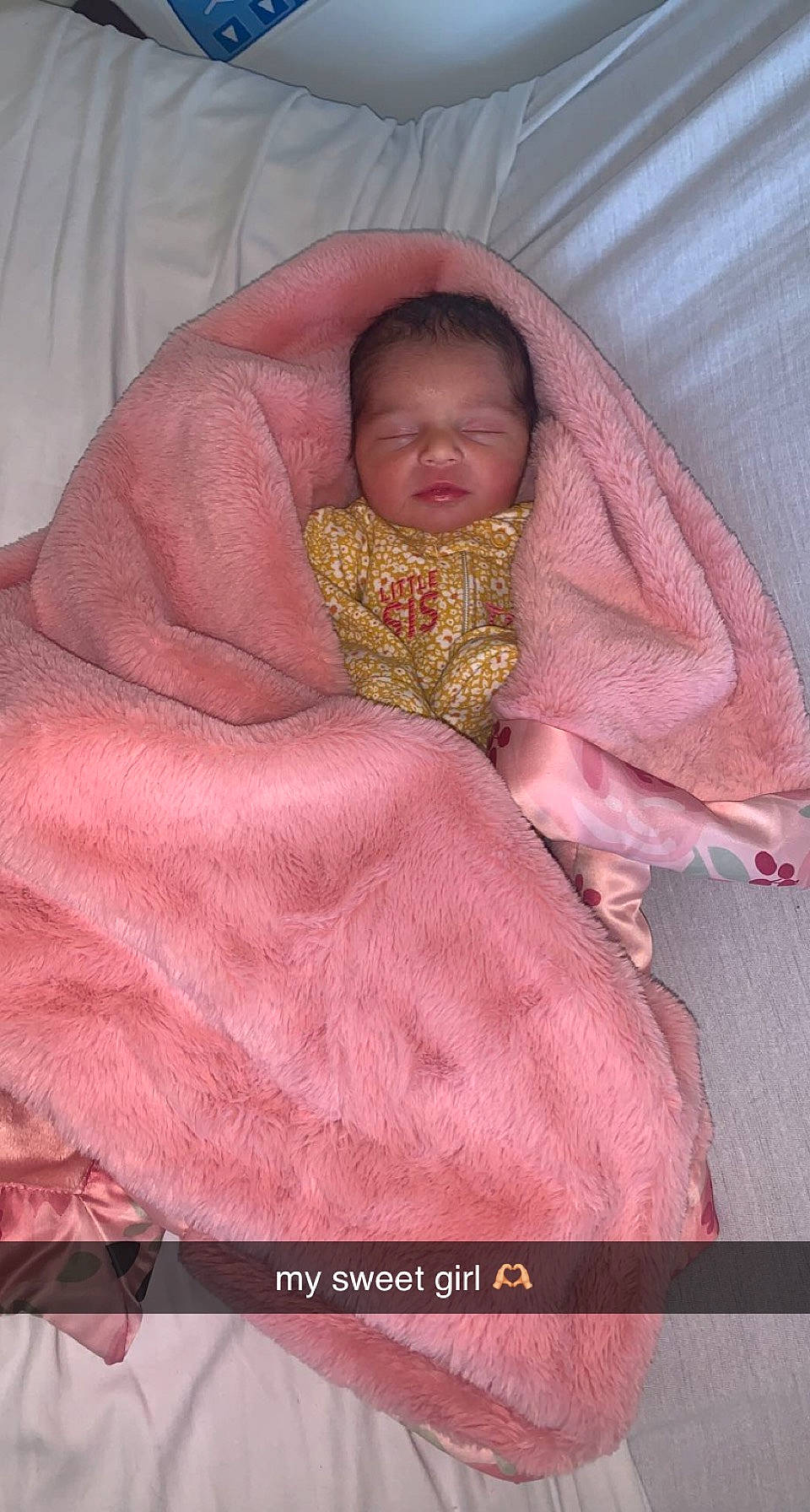 Lavada is registered to the contest to win money with this photo: baby, baby_products, baby_sleeping, bedding, bedtime, cheek, comfort, eye, face, hand, headgear, human_body, linens, magenta, nap, person, pink, room, sleeve, textile