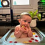 baby, sink, milk_bath, lemon, strawberry, fruit, kitchen, plant, toddler, water, cute, child, bath, tile, window, faucet, indoor, skin, face, hand