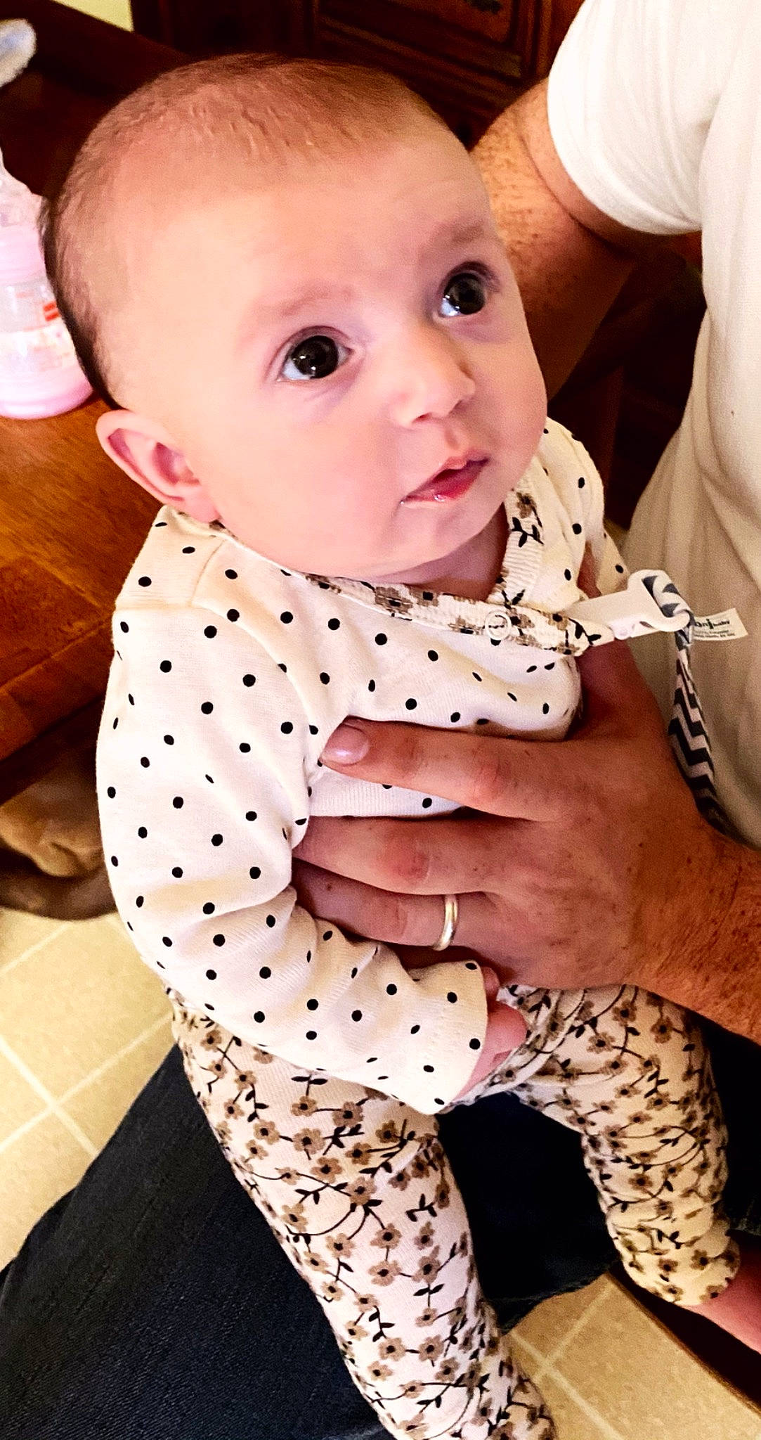 Nola is registered to the contest to win money with this photo: baby, baby_products, baby_toddler_clothing, cheek, child, design, lip, pattern, person, pink, polka_dot, skin, surprise, toddler