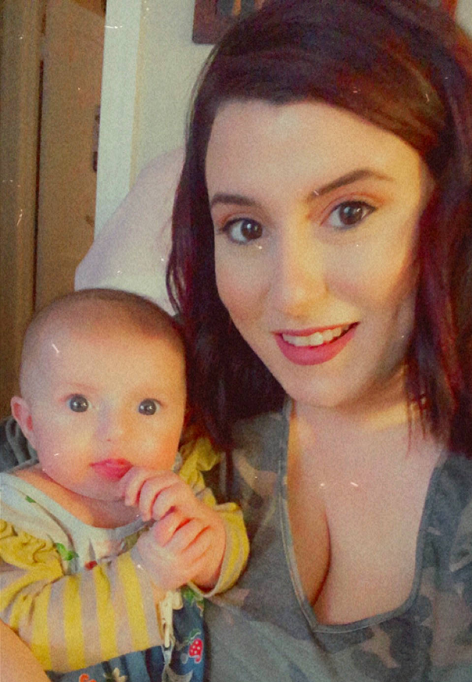 Nola is registered to the contest to win money with this photo: baby, brown_hair, cheek, child, eye, eyebrow, face, hair, iris, joy, lip, long_hair, nose, people, person, photography, selfie, skin, smile, toddler