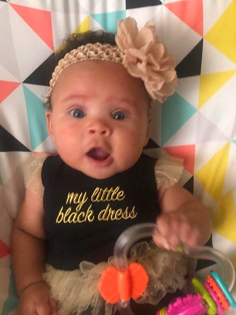 Kiana joined the competition — help win amazing prizes! baby, baby_products, baby_toddler_clothing, baby_toys, cheek, child, costume_accessory, eye, eyelash, hair_accessory, headband, headgear, headpiece, mouth, nose, person, pink, sleeveless_shirt, stuffed_toy, surprise