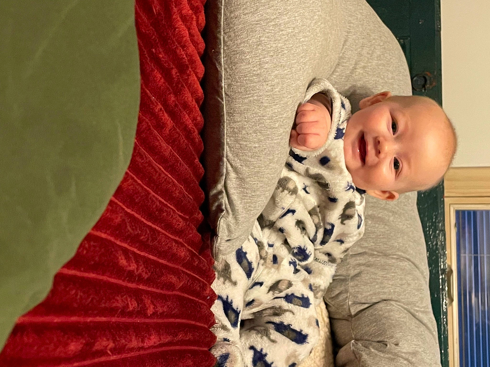 Paxton joined the competition — help win amazing prizes! baby, baby_toddler_clothing, child, close_up, comfort, couch, eye, flooring, human_body, leg, linens, lip, orange, pattern, person, pink, skin, textile, tints_and_shades, toddler