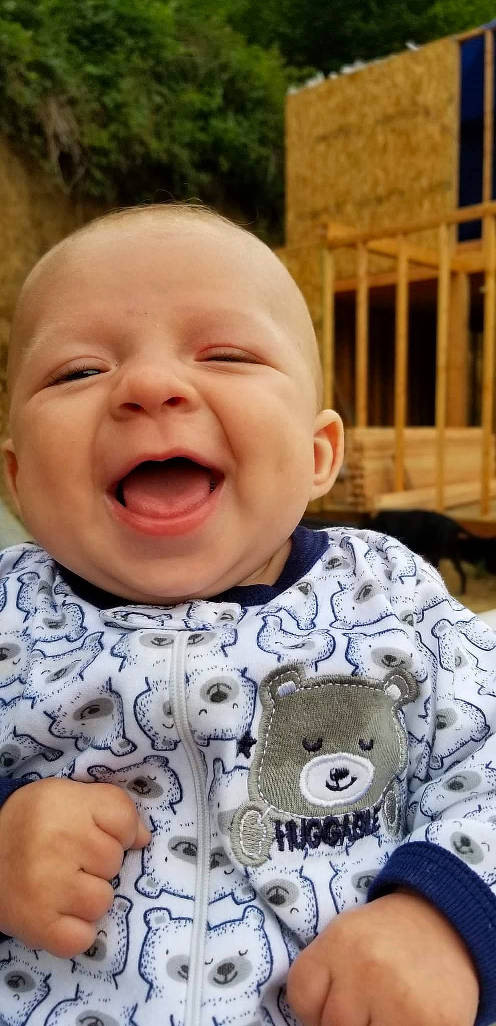 Riddick is registered to the contest to win money with this photo: baby, baby_laughing, baby_making_funny_faces, cheek, child, crying, face, facial_expression, forehead, gesture, happy, laugh, mouth, nose, person, smile, toddler, yawn