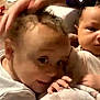 Kaelee joined the competition — help win amazing prizes! child, baby, cuddle, blanket, hand, face, person, indoor, sofa, video_call, technology, family, cozy, young_child, infant, expression, closeup, comfort, parental_care, home