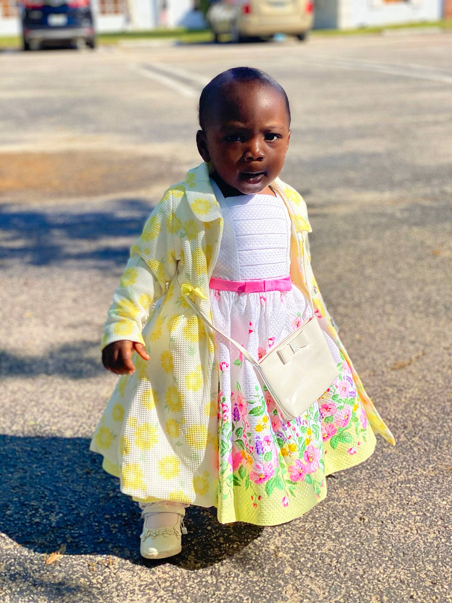 Whitley Tilme joined the competition — help win amazing prizes! asphalt, baby_toddler_clothing, child, day_dress, dress, fun, grass, happy, leisure, magenta, pattern, people_in_nature, person, pink, road, sitting, sleeve, smile, street_fashion, summer