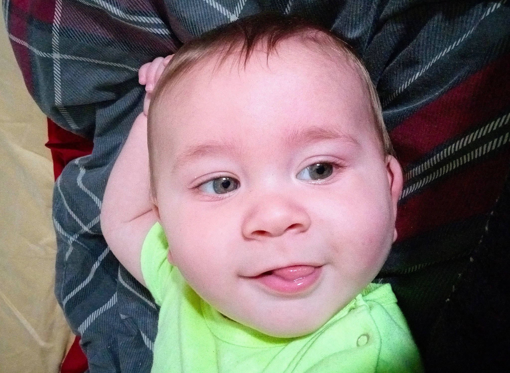 Henry is registered to the contest to win money with this photo: baby, baby_toddler_clothing, beauty, cheek, child, chin, comfort, electric_blue, eyebrow, eyelash, fashion_accessory, happy, iris, nose, person, product, skin, sleeve, smile, tartan