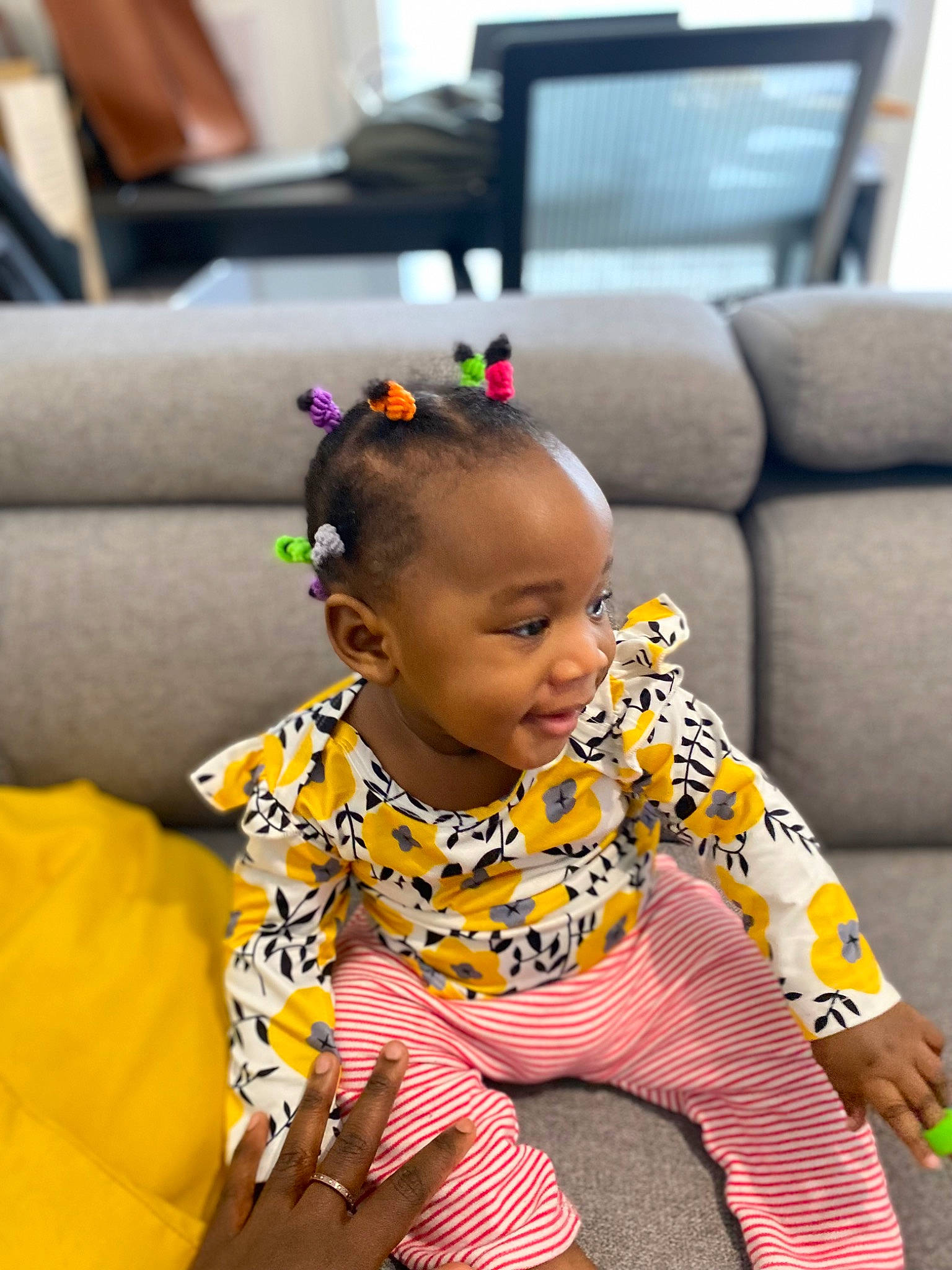 Mikhaela a rejoint le concours — aidez-le/la à gagner de superbes lots ! baby, baby_toddler_clothing, cheek, comfort, couch, dress, eye, flooring, fun, happy, leisure, pattern, person, purple, room, sitting, skin, sleeve, smile, television