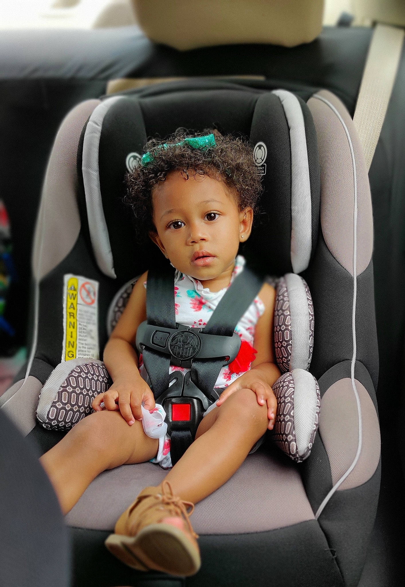 Denver is registered to the contest to win money with this photo: arm, auto_part, automotive_design, baby, car_seat, car_seat_cover, comfort, dress, family_car, head_restraint, leg, motor_vehicle, person, personal_luxury_car, seat_belt, sleeve, steering_wheel, thigh, toddler, vehicle