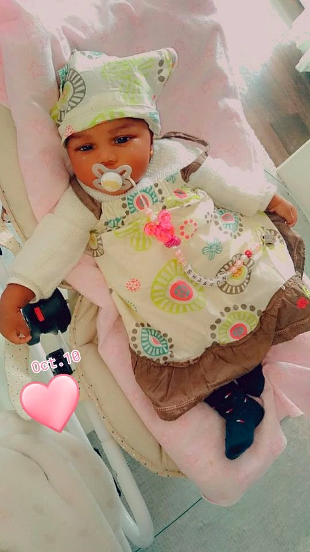 Shaaron a rejoint le concours — aidez-le/la à gagner de superbes lots ! baby, baby_products, baby_toddler_clothing, baby_toys, costume, costume_accessory, costume_hat, headwear, pattern, peach, person, pink, plush