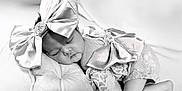 Parys participe au concours pour gagner de l'argent avec cette photo : adorable, baby, black_and_white, bow, child, closeup, clothing, cute, headwear, infant, lace, newborn, peaceful, pillow, portrait, resting, sleeping, soft_texture, studio, toddler