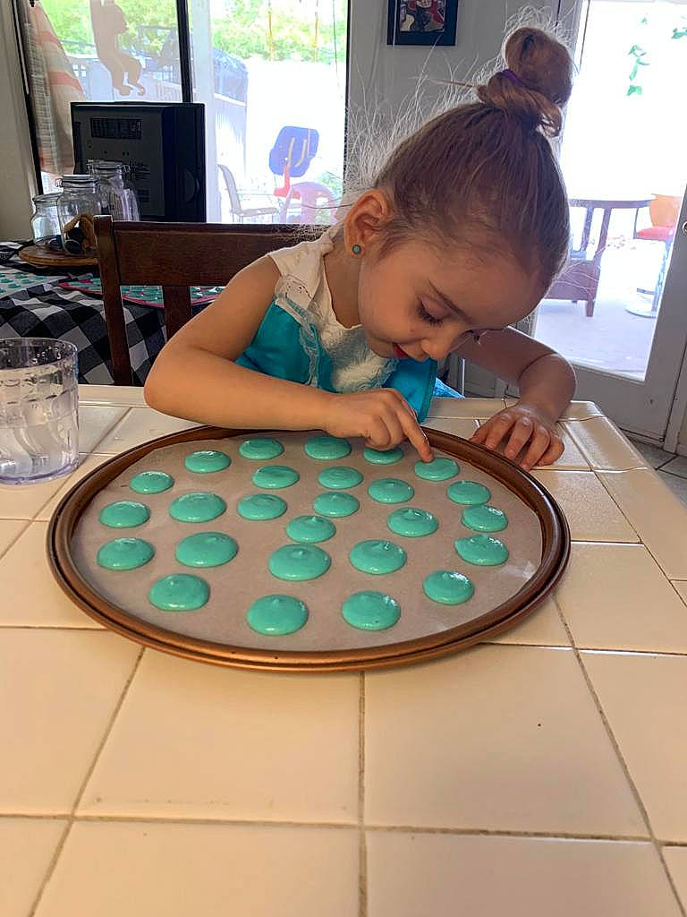 Isabelle joined the competition — help win amazing prizes! art, audio_equipment, board_game, child, circle, eyewear, flooring, fun, games, glass, indoor_games_and_sports, leisure, pattern, person, play, recreation, smile, t_shirt, table, tabletop_game