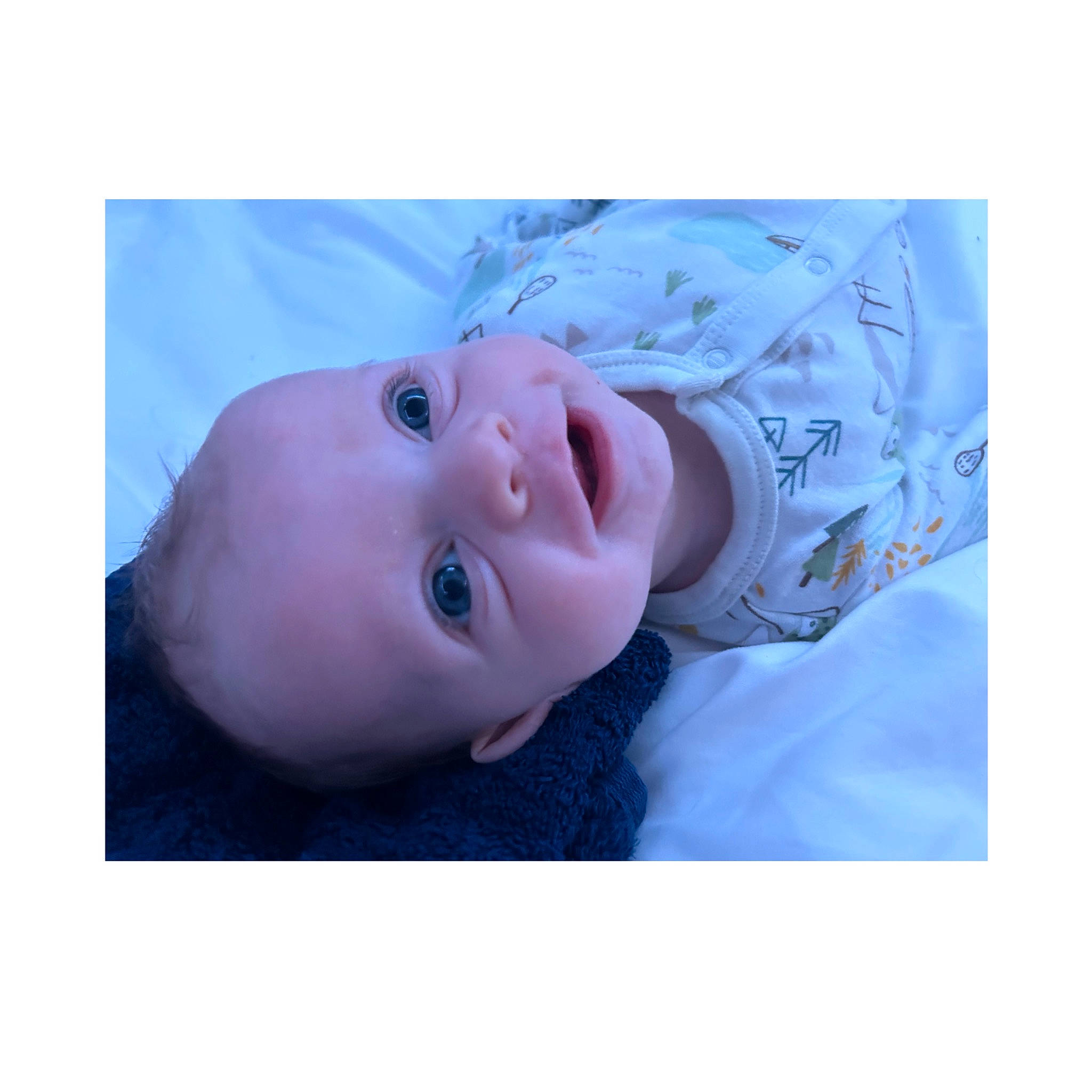 Jasper is registered to the contest to win money with this photo: baby, baby_products, baby_toddler_clothing, cheek, child, cloud, electric_blue, eye, eyelash, face, fashion_accessory, flash_photography, happy, hat, outerwear, pattern, person, portrait_photography, sleeve, smile