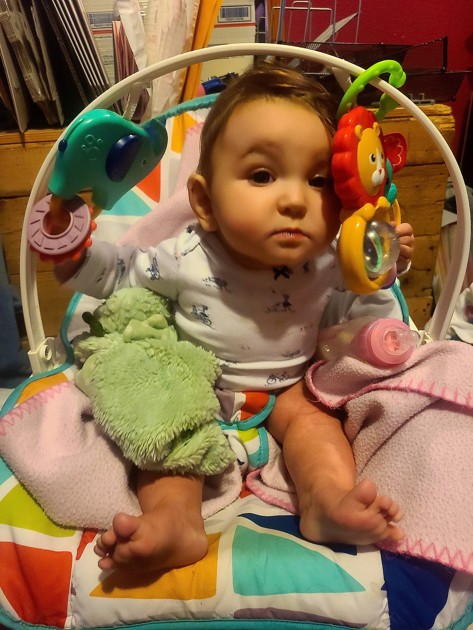 Zev is registered to the contest to win money with this photo: baby, baby_toddler_clothing, cheek, child, eye, facial_expression, fun, happy, head, human_body, iris, mammal, mouth, nose, person, product, skin, stuffed_toy, textile, toddler