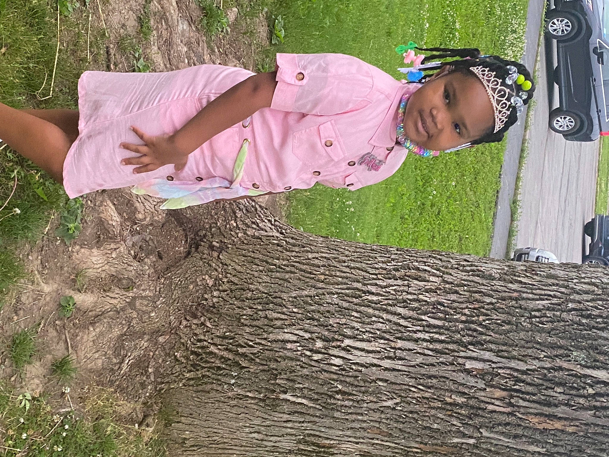 Janiyah is registered to the contest to win money with this photo: baby, baby_toddler_clothing, eyewear, fun, grass, grassland, happy, hat, headwear, landscape, leisure, people_in_nature, person, plant, shadow, sitting, soil, sunglasses, t_shirt, toddler