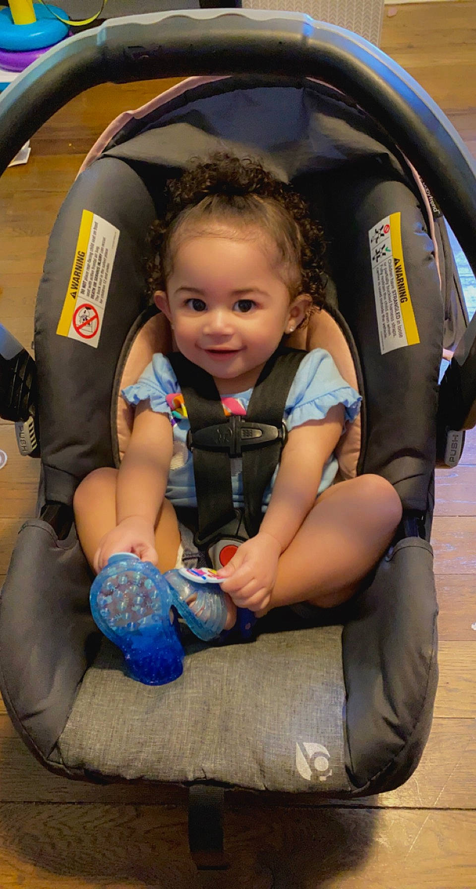 Aubriella is registered to the contest to win money with this photo: automotive_design, automotive_exterior, automotive_tire, baby_carriage, car_seat, child, comfort, electric_blue, fun, hand, happy, joy, leisure, motor_vehicle, person, recreation, skin, smile, sneakers, toddler