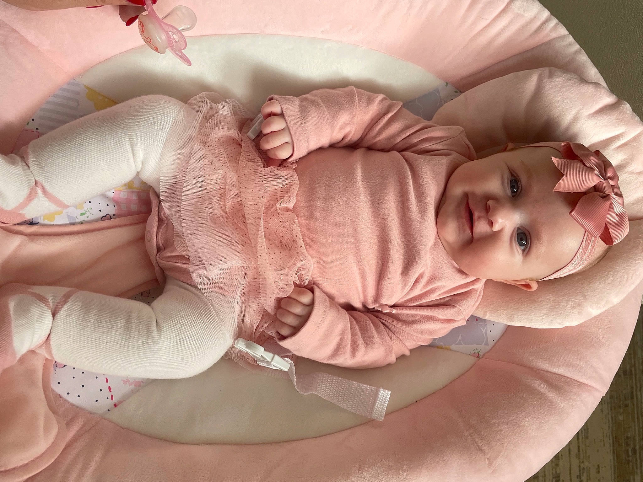 Isla-rose is registered to the contest to win money with this photo: baby, baby_sleeping, baby_toddler_clothing, child, comfort, elbow, gesture, happy, human_body, human_leg, knee, leg, mouth, person, pink, sitting, skin, sleeve, smile, thigh