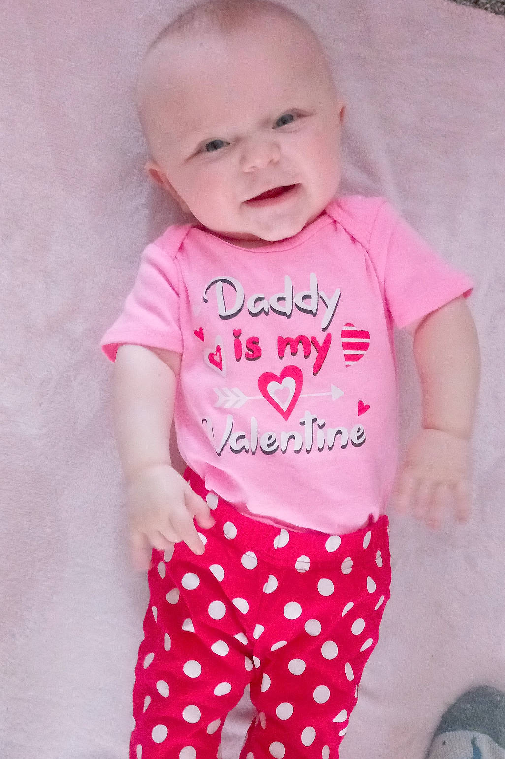 Paisley joined the competition — help win amazing prizes! baby, baby_products, baby_toddler_clothing, child, clothing, design, infant_bodysuit, pajamas, pattern, person, pink, polka_dot, product, skin, sleeve, smile, t_shirt, toddler